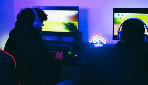 What Are the Health Implications of Engaging in Competitive E-Sports, and How Can Risks Be Mitigated?